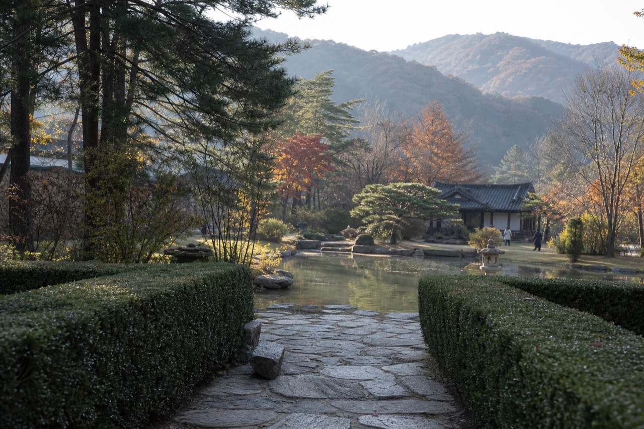 Formal themed garden with manicured hedges, stone paths and a pond at the Garden of Morning Calm, no text, no logos, no people